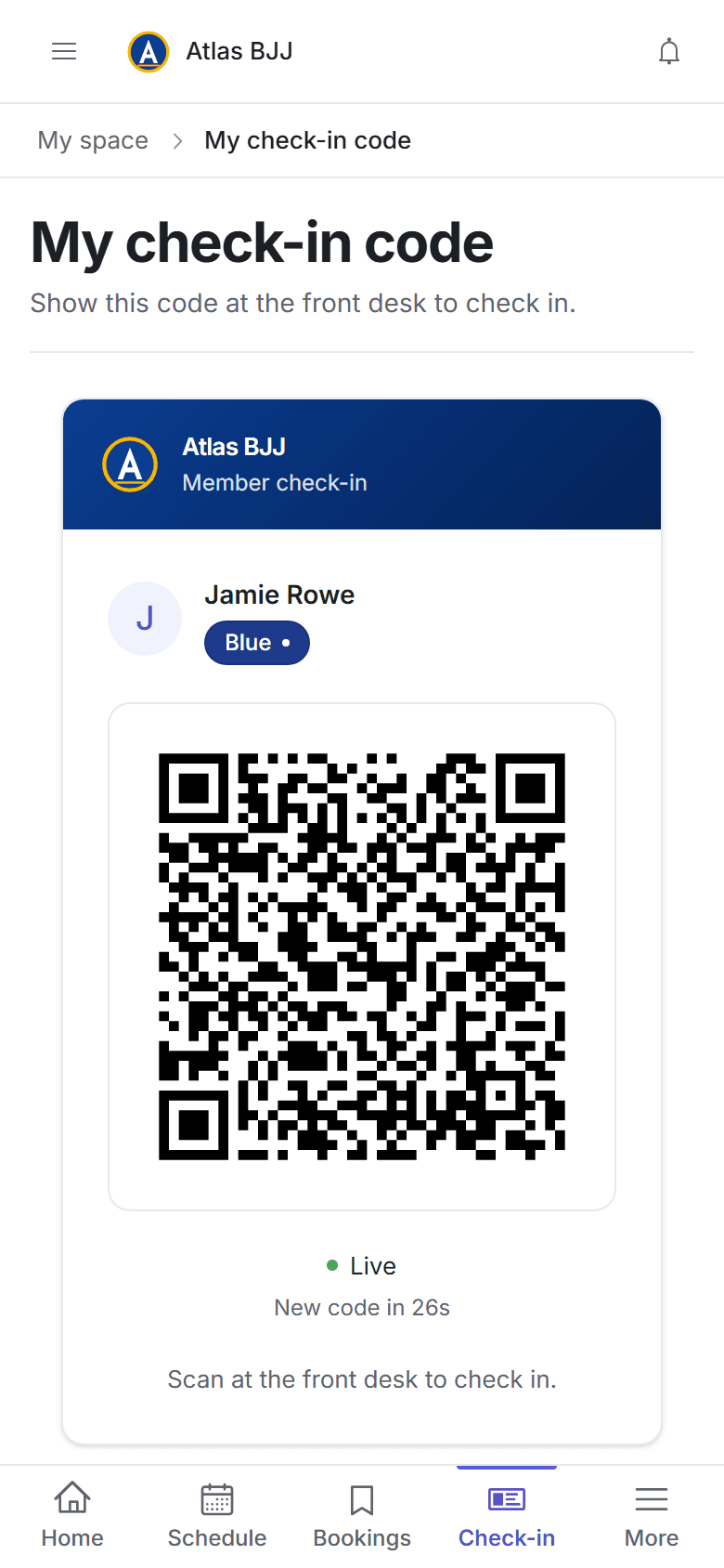 A member's check-in QR code on a phone