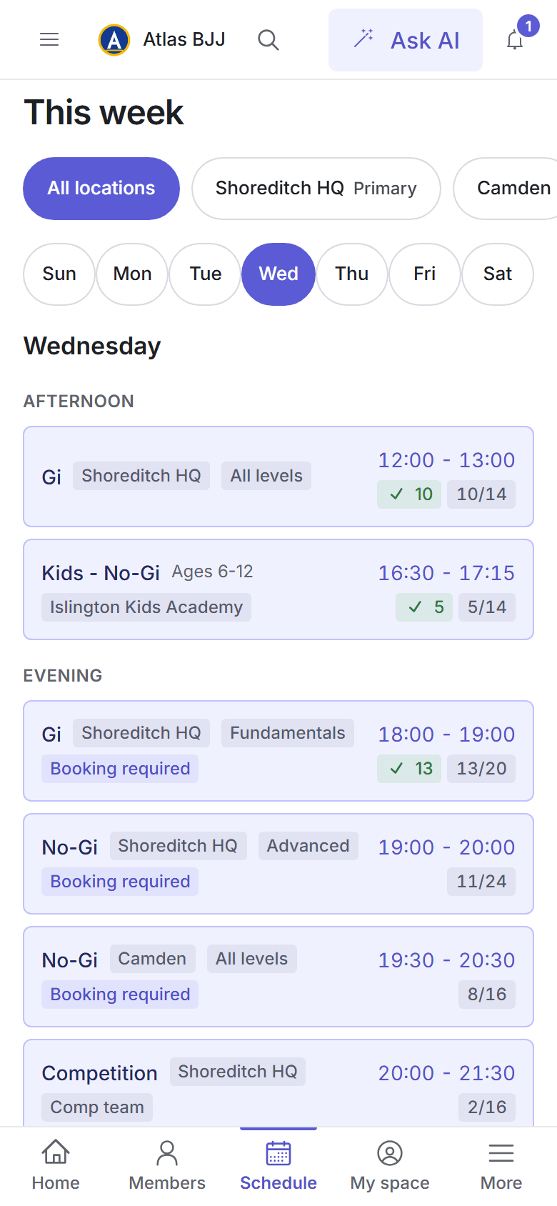 The day's classes on a phone, with booked and checked-in counts